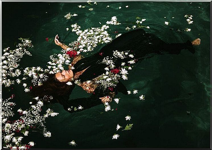 Woman floats in the water