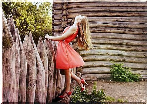 Girl in a red dress and high heels