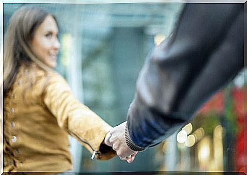 Healthy couples walk hand in hand