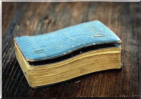 Old book on a wooden table