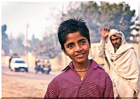 Boy and man in India