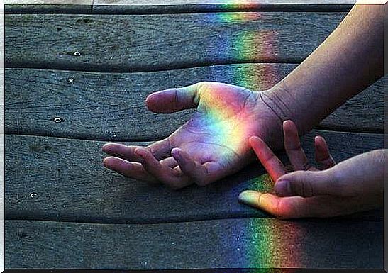 Rainbow Shines On The Hands Of The One Who Can Dream That Everything Is Possible