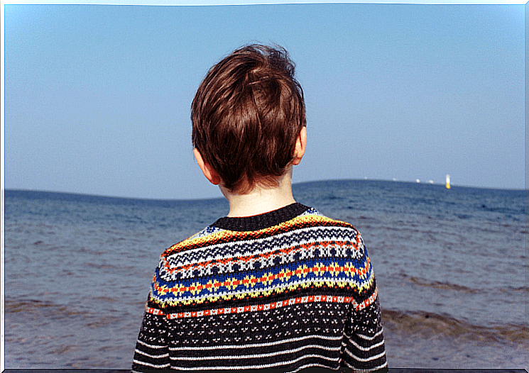 Lonely boy at the sea