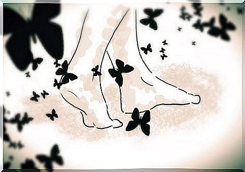 Feet walking through little black butterflies