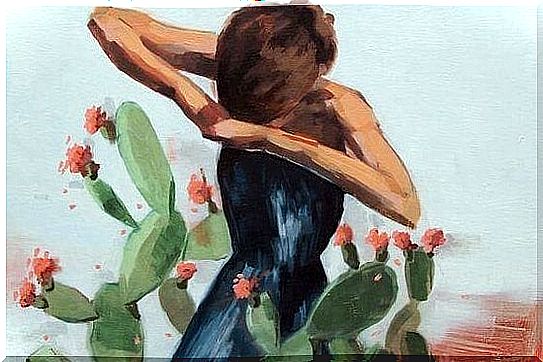 Girl standing between the cacti