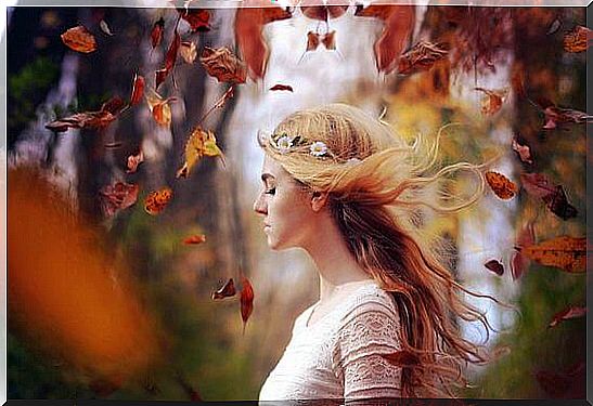 Woman in Autumn Forest